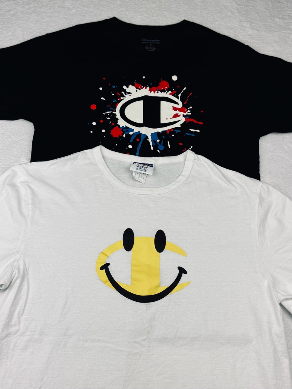 Champion graphic t-shirts, lot of 2 Size M. Great preowned condition.